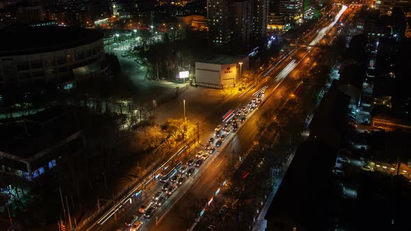 Beijing Night Aerial Cityscape Panorama with Road Traffic China Timelapse Pan Up