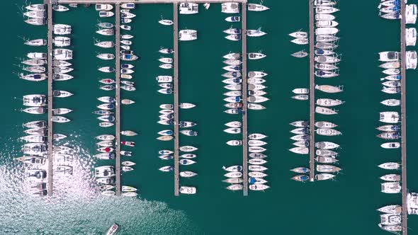 Aerial view of Lefkada town and marina on the Ionian island. Sailboats in the harbour.