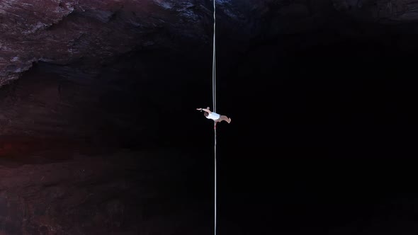 Extreme Sport of Slacklining Top View on a Man Walking the Tightrope