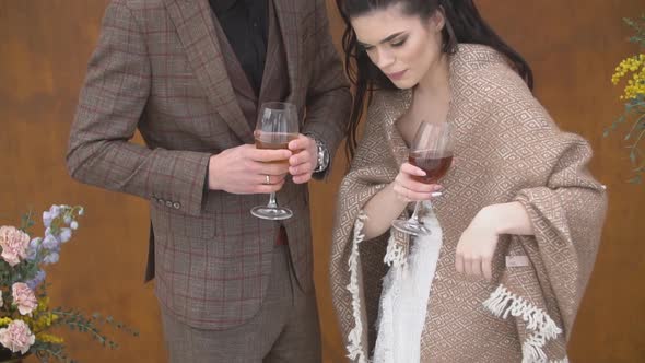 Young Couple Drinks Wine