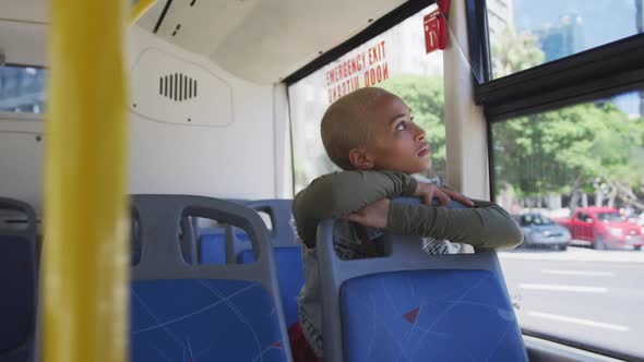 Mixed race woman taking the bus