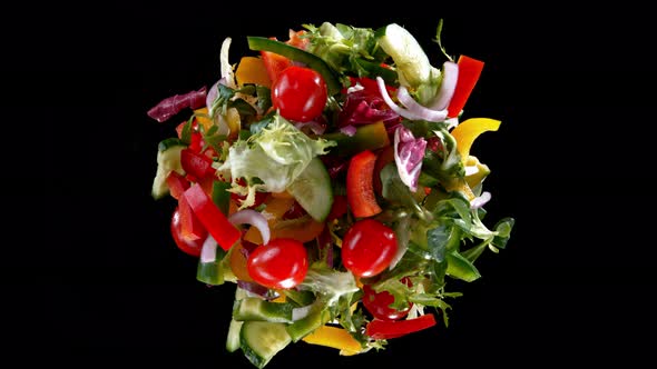 Super Slow Motion Shot of Rotating Exploded Salad Mix on Black at 1000Fps