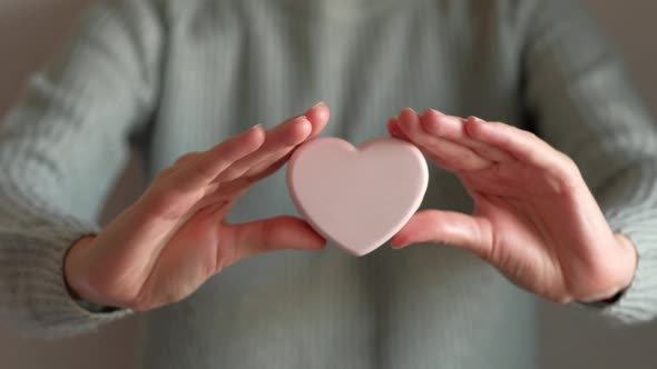 Soap in the Shape of a Heart in a Girl's Hand