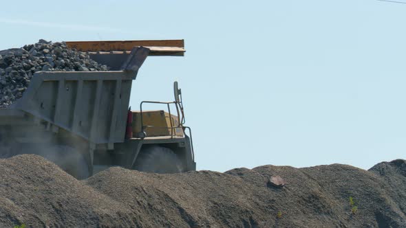 A Large Truck Transports Ore at an Industrial Plant