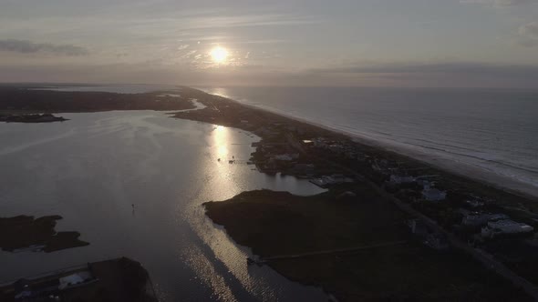 Aerial of the Sun Reflecting on the Water in Westhampton New York