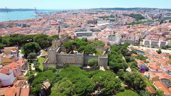 Drone Shot of a Castle in Lisbon, Castelo de S. Jorge from above - drone shot