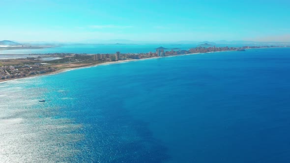 Aerial View. Flight Over Gorgeous Islands, Long Spit La-Manga,Spain, Beautiful Azure Sea and Hills