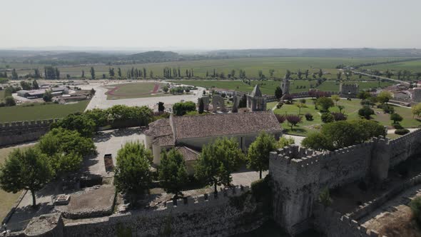 Ancient and imposing castle of Montemor-o-Velho in Portugal; drone pan