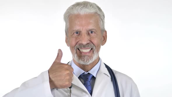 Thumbs Up By Senior Doctor Isolated on White Background