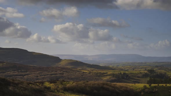 Time lapse of rural agricultural nature landscape during the day in Ireland. alt