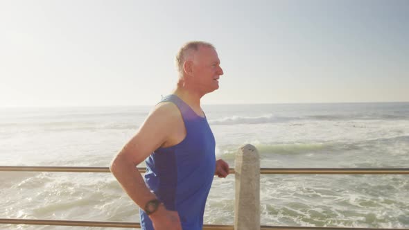 Senior man running on the promenade