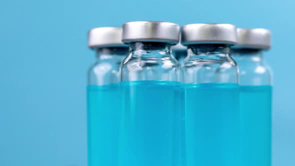Glass Vials of with Blue Coloured Liquid