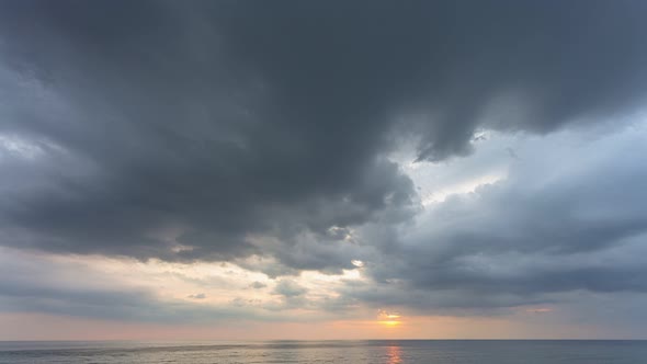 Time Lapse Cloudy Moving In To The Sea.