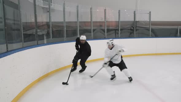 Hockey Player Boarding Opponent During Game