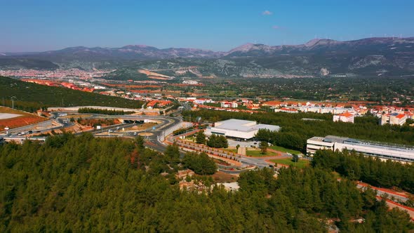 Aerial Panoramic View of City Infrastructure in Mountain Area