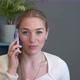 Woman Mobile Phone Speaking Looking at Camera Working at Home - VideoHive Item for Sale