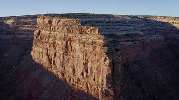 Aerial shot of the cliffs along the edge of Cedar Mesa in Southern Utah