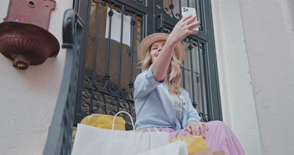 Cheerful Traveler in Stylish Outfit Making Selfie During Europe Summer Vacation