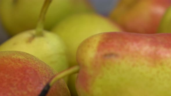 Green Pears on the Market Close-up. The Camera Is Moving.