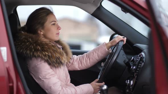 The Girl is Parked Turns Off the Car Gets Out of the Car  Slow Mo