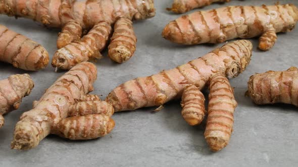 Fresh healthy turmeric in slices to ground