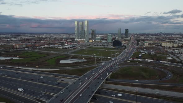 Aerial view of Highway 7 and Highway 400 in Vaughan, Canada as a Sea gull tries to attack the camera