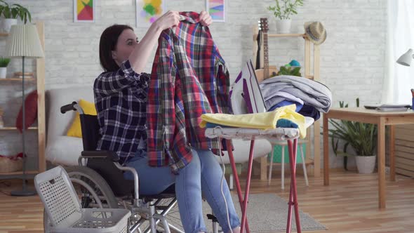 Young Disabled Woman Housewife Washing Clothes Housework