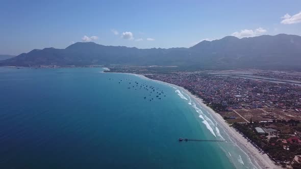 Drone Footage of Sea Coastline with Entertainment Area.