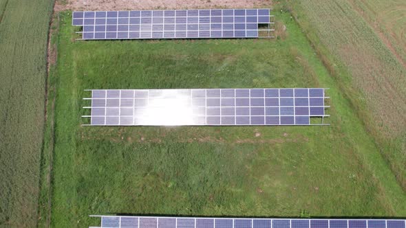 Ecology solar power station panels in the fields green energy at sunset landscape electrical innovat