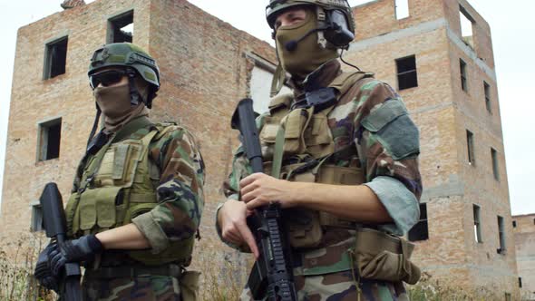 Army Soldiers Walking with Guns alt