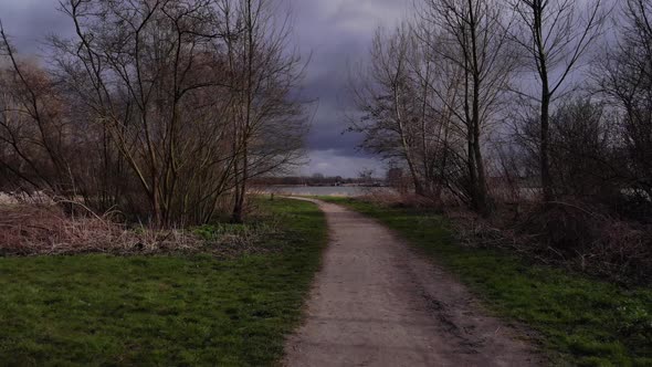 Meadows Between Narrow Road Near Oude Maas River In Puttershoek, Netherlands. - Dolly Shot