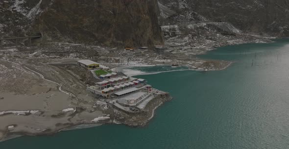 Tranquil Lake Surrounded By Rocky Slopes Mountains At Attabad Lake, Gojal Valley, Hunza, Gilgit-Balt