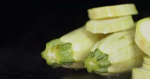 Sliced and Whole Zucchini with a Cool Steam. 