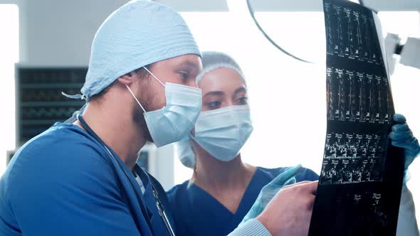 Professional medical doctors working in emergency medicine. Portrait of surgeon and the nurse.