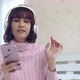 Young pretty woman enjoying with music at home - VideoHive Item for Sale