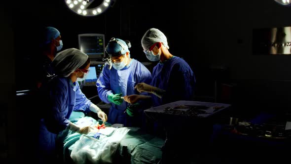 Surgeons performing operation 4k