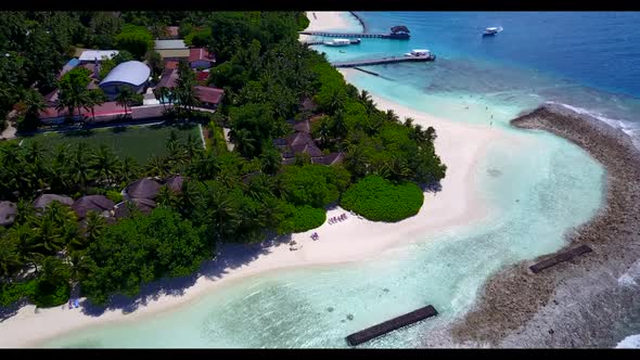 Aerial above tourism of tropical island beach holiday by transparent lagoon and white sandy backgrou