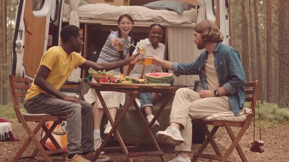 Multiethnic Friends Having Trailer Party at Campsite