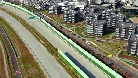 Drone shot highway motorway showing lanes with Tunnel and viaducts outside the city of Warsaw, Polan