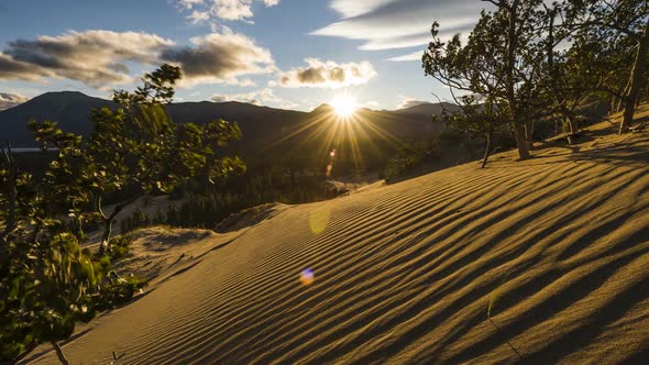 Sunset Over Sand Dunes in Mountains of Yukon  Time Lapse