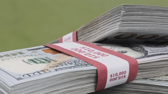 Dollars Bundles Rotate on Green Background Heap of Money