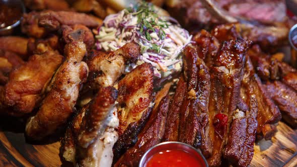 Meat grill set for beer party served on table in bar