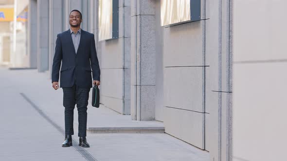 Confident Joyful African American Young Adult Businessman Wearing Suit Excited By Good News Says Yes