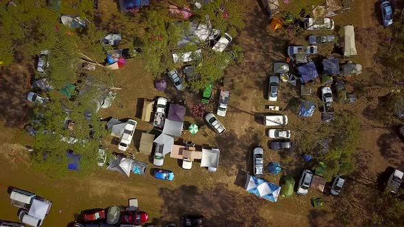 Aerial view of campers and tents at festival.