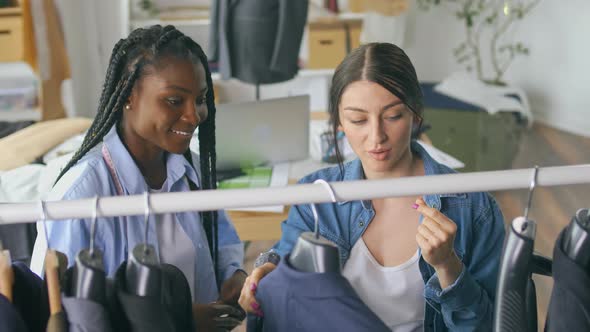 Successful Fashion Designers a Caucasian Woman and an AfricanAmerican Woman