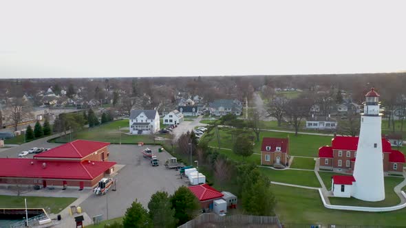 Fort Gratiot Lighthouse in Port Huron, Michigan with drone videoing sideways close up.