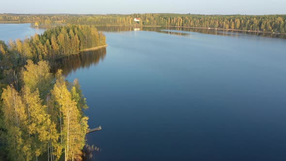 An Aerial View of the Trees on the Side of the Huge Lake Saimaa in Finland