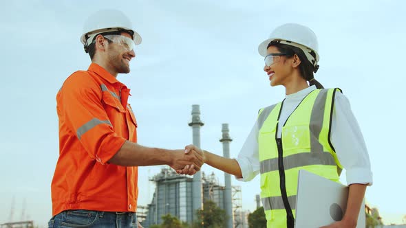 confident engineer and contractor successful business achievement hand shaking together