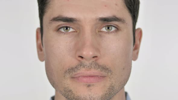 Close Up of Serious Man Face, White Background