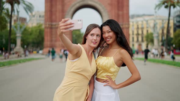 Happy Young Charming Women of Different Ethnics Best Friends Making Selfportrait Picture Outdoors